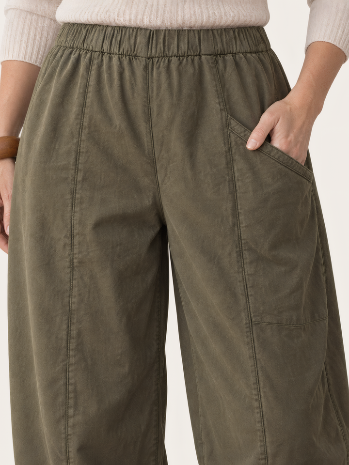 Eleven Stitch Design By Gerties Pocket Pant in African Olive, close up of the fabric and details