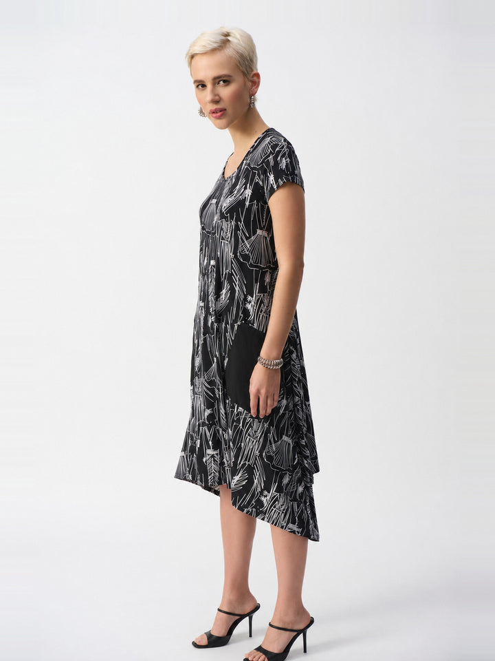 Joseph Ribkoff Silky Knit Print Cocoon Dress in Black and Vanilla, side view on model