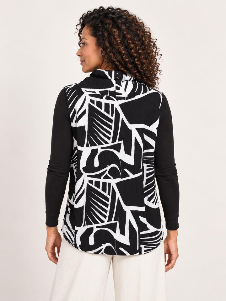 Back view, Kozan Aris Vest in Yang, cowl neck and geometric print
