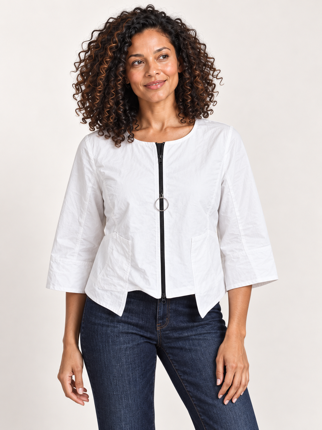 Kozan Arturo Jacket in White, cropped zip jacket with black ring pull zip, front view on model