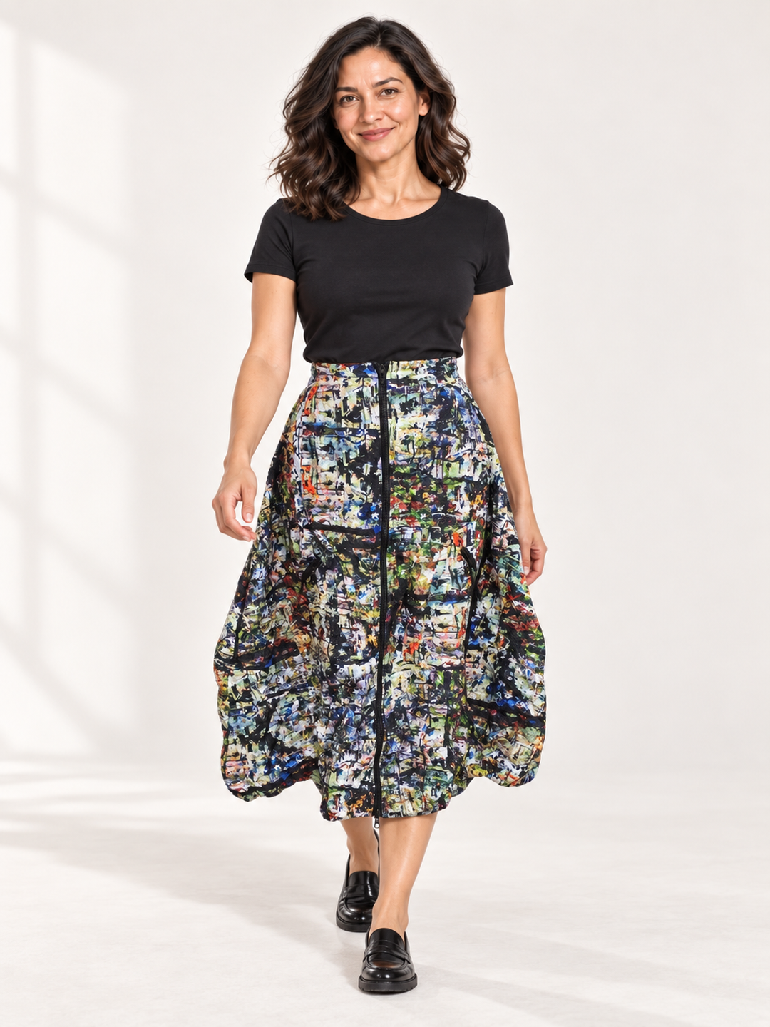 Kozan Astrid Skirt in City, multicolor splatter print bubble skirt with exposed front zip, front view on model