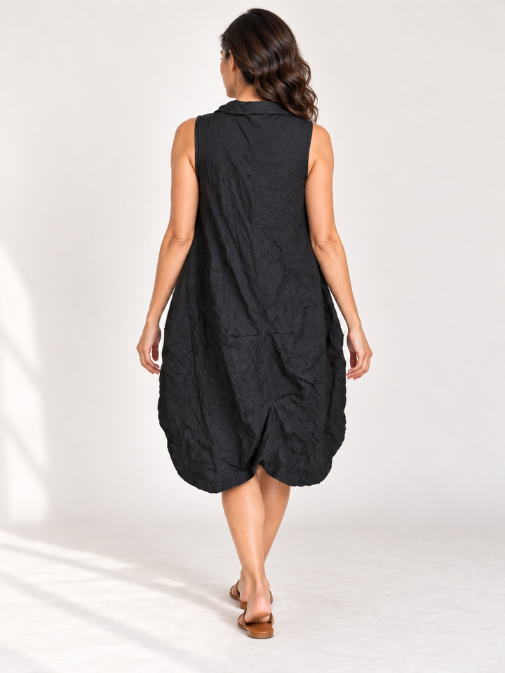 Back view, Kozan Aubrey Dress in Black Crush, cocoon hem