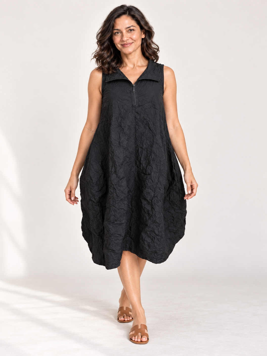 Kozan Aubrey Dress in Black Crush, sleeveless crinkle cocoon dress with zip collar, front view on model