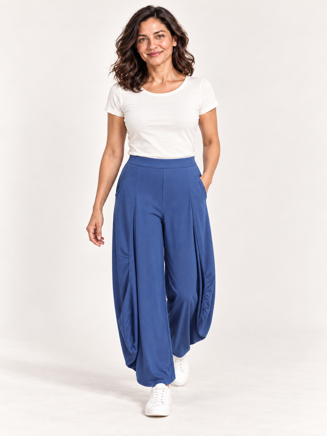 Kozan Jade Pant in Marlin, marine blue balloon leg pant with side pockets, front view on model