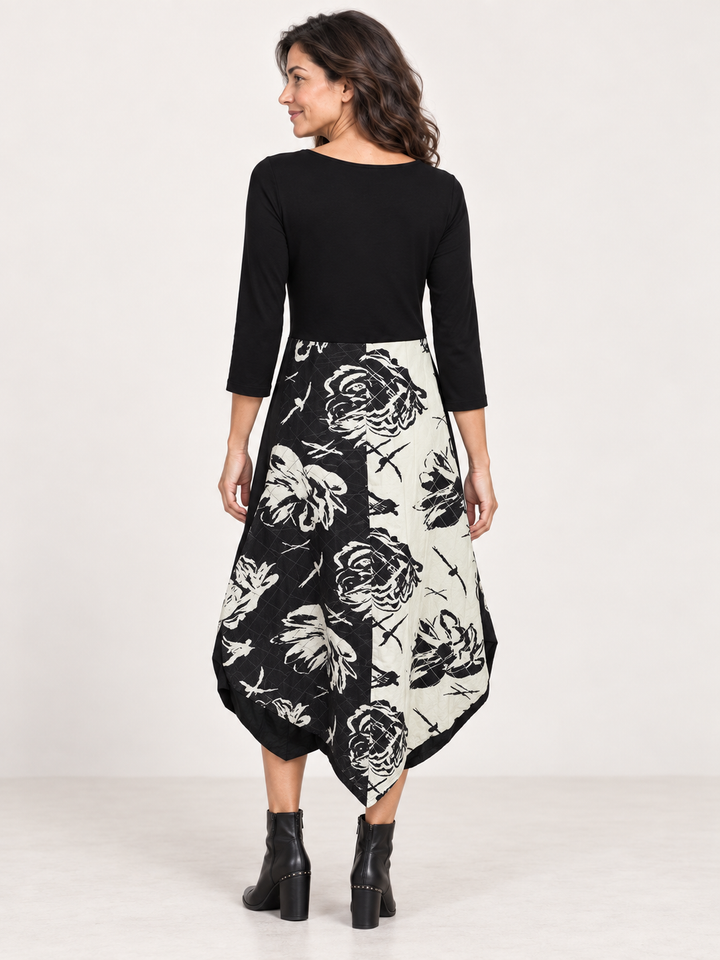 Back view, Kozan Jessica Dress in Eden, black bodice and rose print skirt
