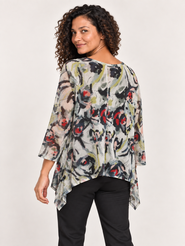 Back view, Kozan Mila Topper in Fiore, ivory floral print mesh with black, red and lime