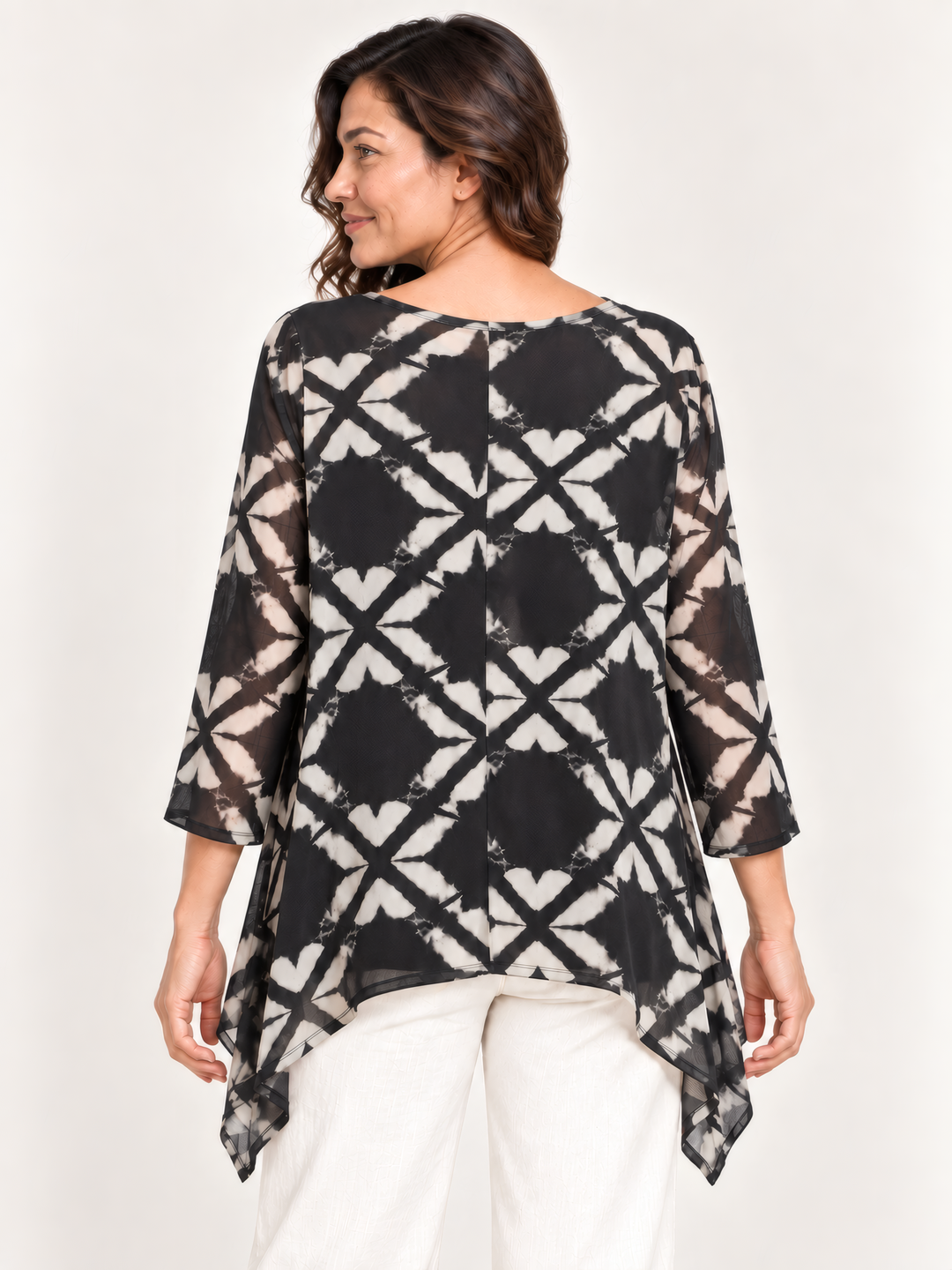 Back view, Kozan Mila Topper in Optic, black and cream geometric print mesh, center back seam