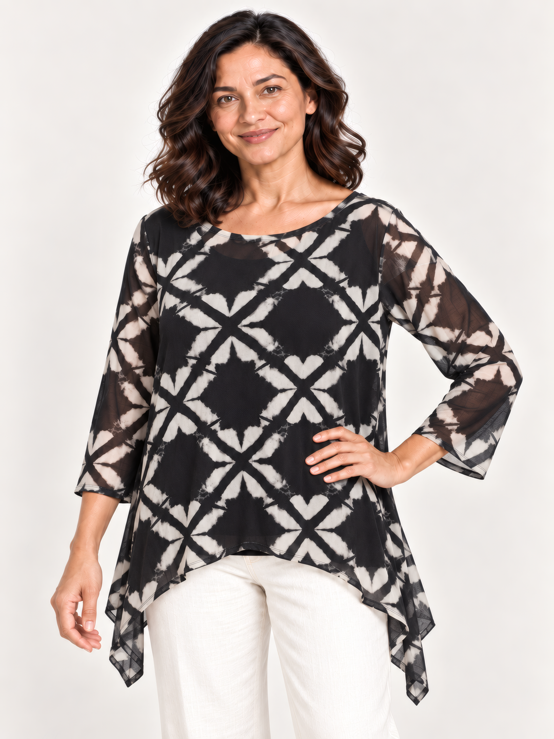 Kozan Mila Topper in Optic, black and cream geometric print mesh, wide round neck, A line hem, on model