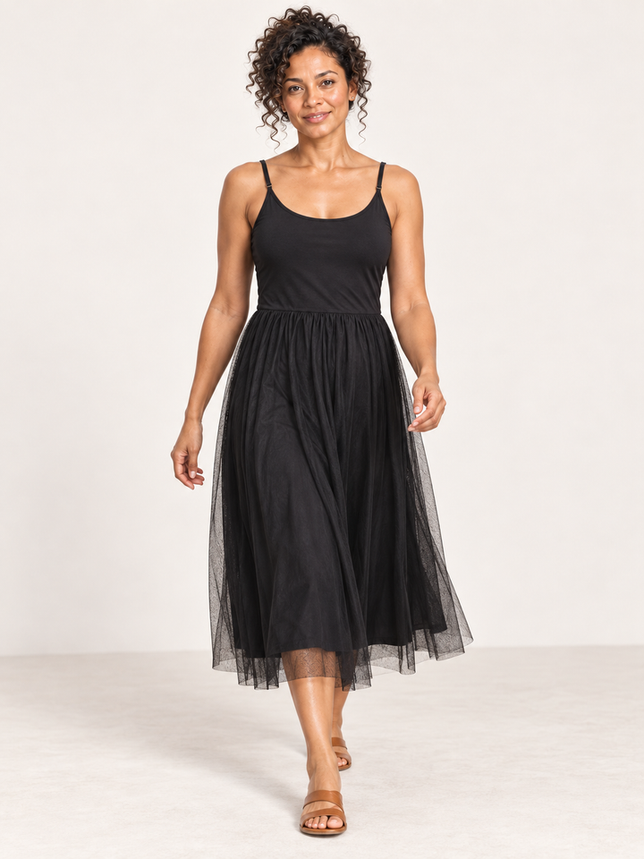 Kozan Sandy Dress in Black, strappy midi with fitted bodice and tulle overlay skirt, front view on model