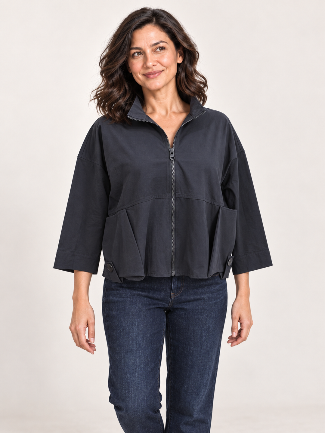 Kozan Vance Jacket in Coal, charcoal zip jacket with stand collar and large pleated pockets, front view on model