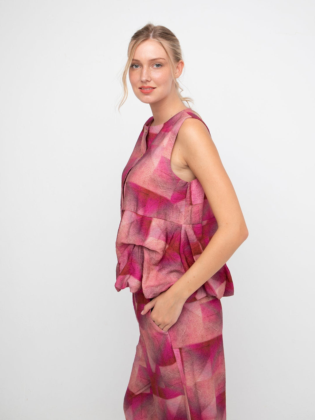 Ozai N Ku Feinos Button Tank in Geo Pink, side view on model