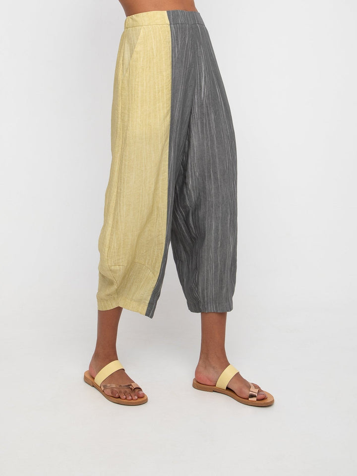 Ozai N Ku Lookout Lantern Pants in Slate and Butter, side view on model