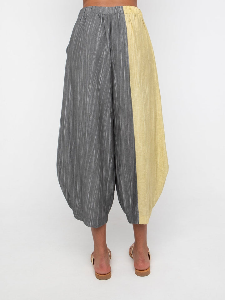 Ozai N Ku Lookout Lantern Pants in Slate and Butter, back view on model