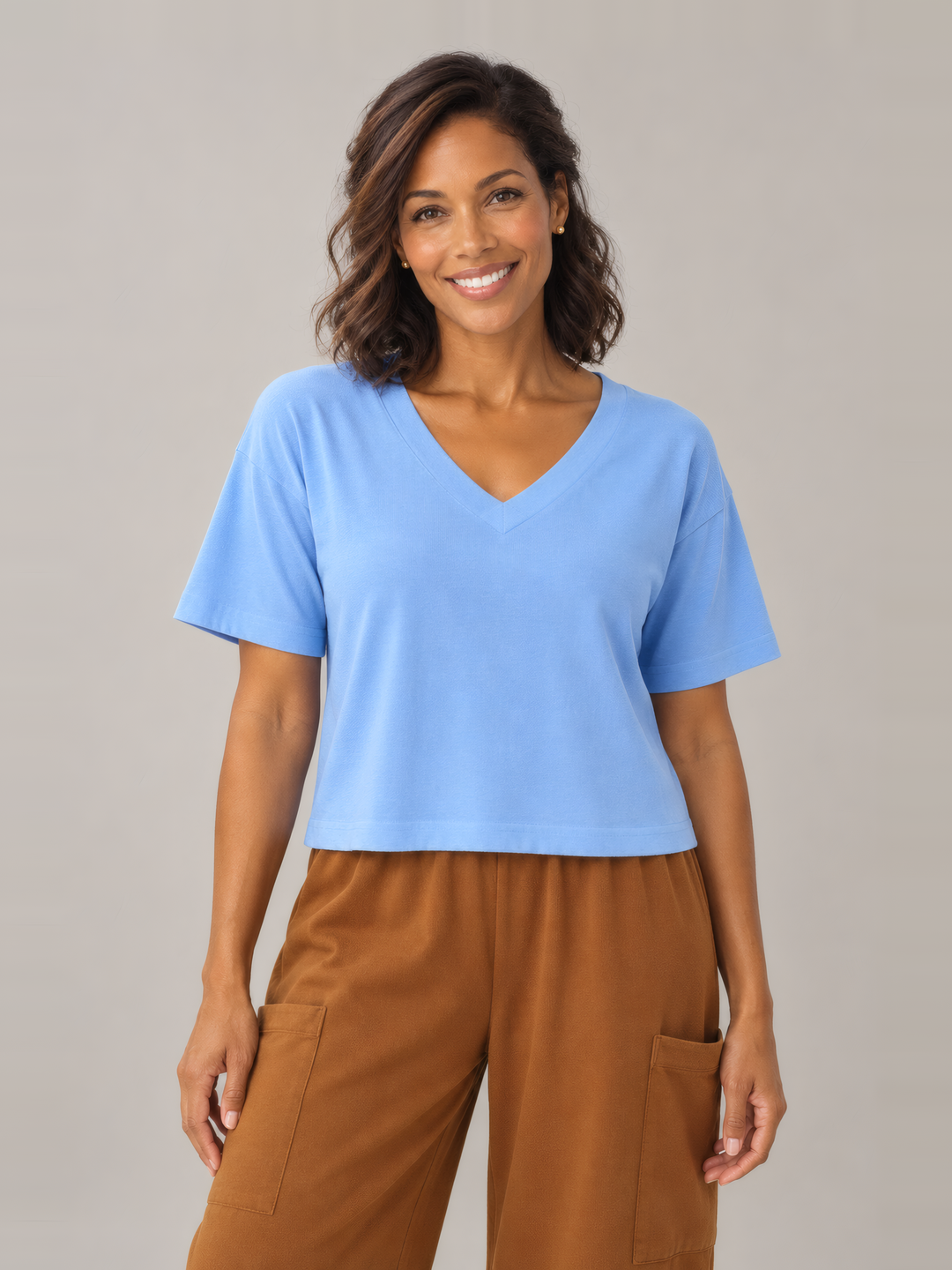 Pacific Cotton Short Sleeve Crop Top in Estero, front view on model