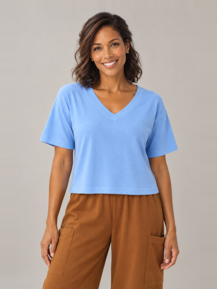 Pacific Cotton Short Sleeve Crop Top in Estero, front view on model